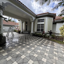 Pressure-washing-of-driveway-pool-patio-and-home-in-prestigious-Bay-Hill-Estates-in-Palm-Beach-Gardens-FL-33412 1